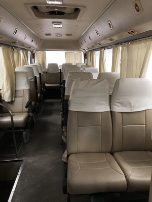 موتور 90 کیلووات 21 صندلی اتوبوس مسافری کارکرده زیر لیوانی Toyota Coaster 2009 عملکرد خوب